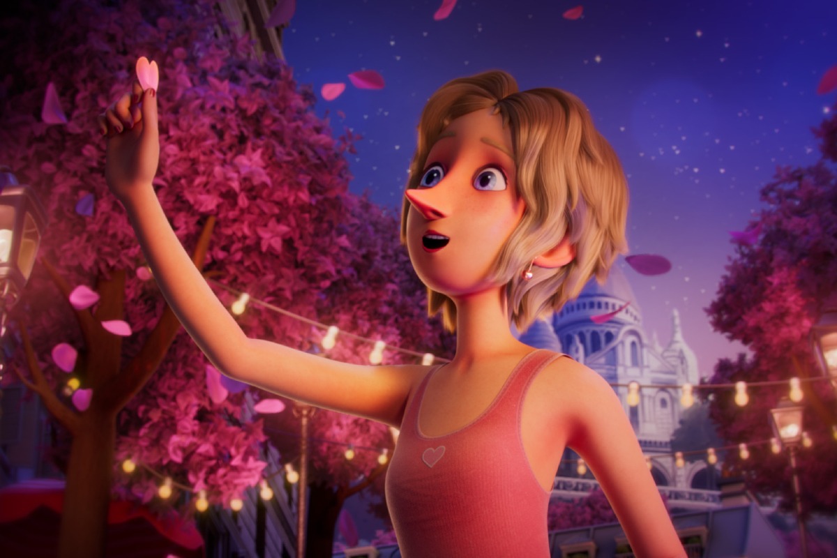 Animação de personagem feminina admirando uma pétala rosa em rua iluminada, com árvores floridas ao fundo.